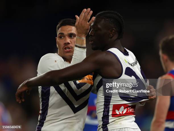 Michael Walters of the Dockers celebrates with Michael Frederick after scoring a goal during the round 16 AFL match between Western Bulldogs and...