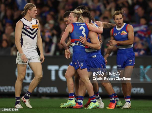 Cody Weightman of the Bulldogs celebrates after scoring a goal during the round 16 AFL match between Western Bulldogs and Fremantle Dockers at Marvel...