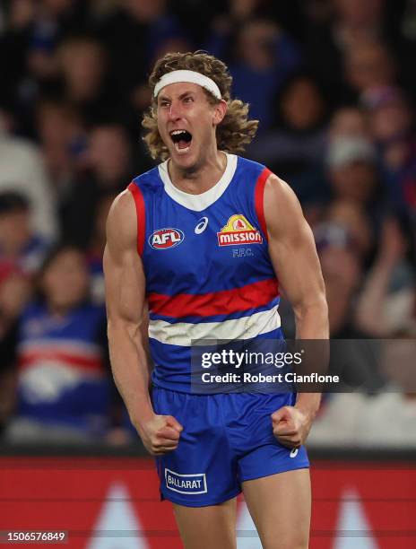 Aaron Naughton of the Bulldogs celebrates after scoring a goal during the round 16 AFL match between Western Bulldogs and Fremantle Dockers at Marvel...