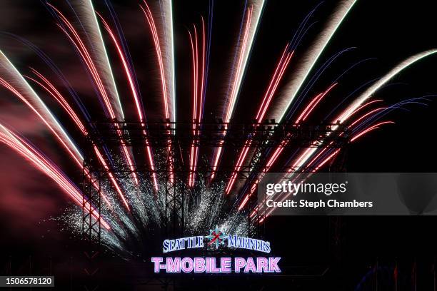 Fireworks illuminate the Seattle Mariners and T-Mobile Park signage after the game against the Tampa Bay Rays on June 30, 2023 in Seattle, Washington.