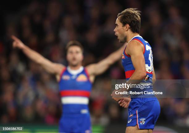 Lachlan McNeil of the Bulldogs celebrates after scoring a goal during the round 16 AFL match between Western Bulldogs and Fremantle Dockers at Marvel...