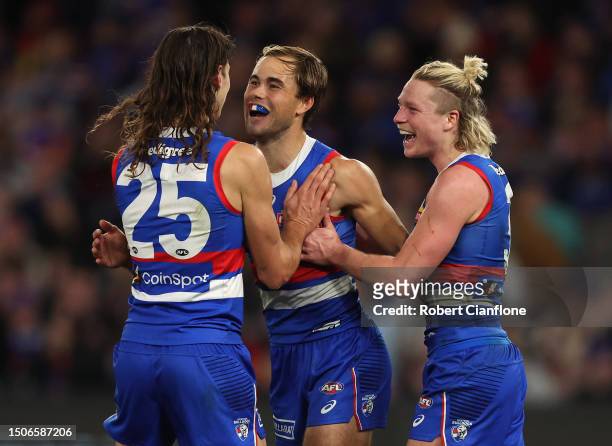 Lachlan McNeil of the Bulldogs celebrates after scoring a goal during the round 16 AFL match between Western Bulldogs and Fremantle Dockers at Marvel...