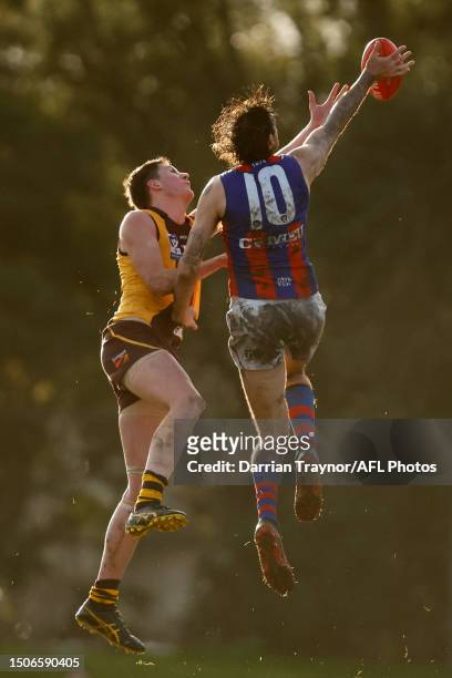 Clay Tucker of Box Hill competes with Sam Naismith of Port Melbourne during the VFL round 15 match between Box Hill and Port Melbourne at Box Hill...