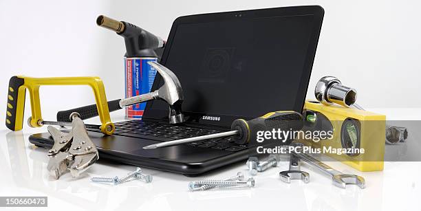 Samsung Series 5 Chromebook, laptop with Google Chrome operating system, surrounded by a group of tools. During a studio shoot for PC Plus Magazine,...