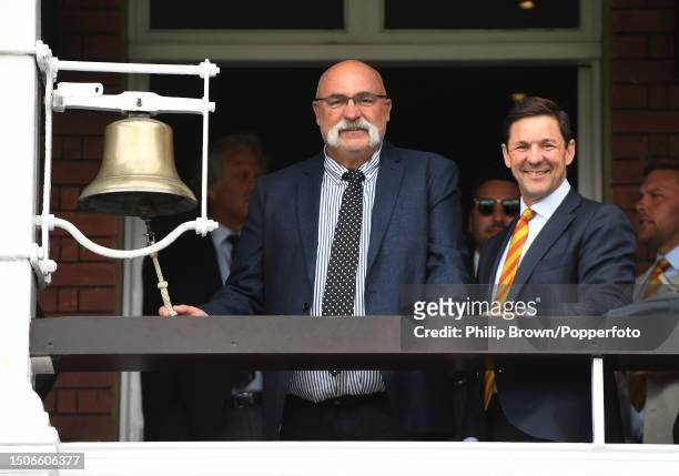 Merv Hughes rings the five minute bell next to Guy Lavender of the MCC before Day Three of the LV= Insurance Ashes 2nd Test match between England and...
