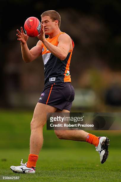 Luke Power takes a mark during a Greater Western Sydney Giants AFL training session at Harry Trott Oval on August 24, 2012 in Melbourne, Australia.