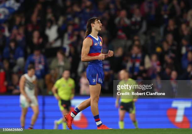Caleb Pulter of the Bulldogs celebrates victory on the siren during the round 16 AFL match between Western Bulldogs and Fremantle Dockers at Marvel...