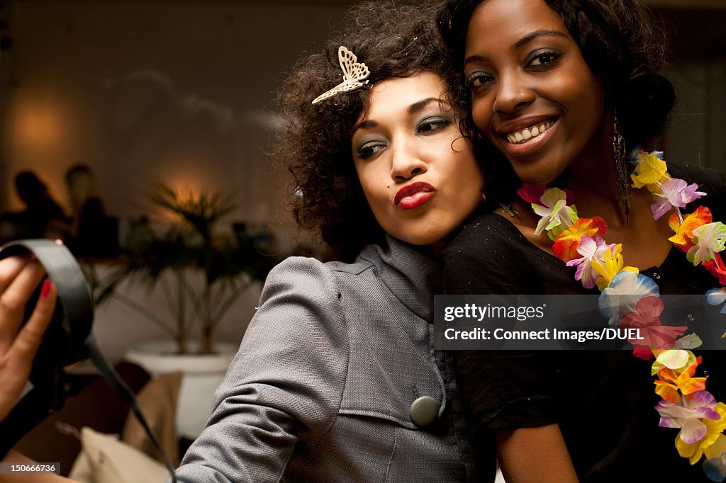 Women taking picture of themselves