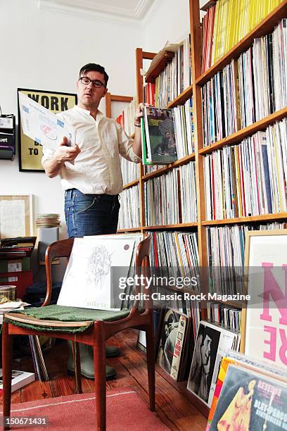 Portrait of Jonny Trunk at home with his collection of vinyl records, taken on December 21, 2010. Trunk is the founder of independent record label...