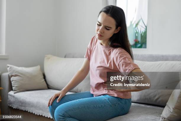 kidney problems - womens hips stock pictures, royalty-free photos & images