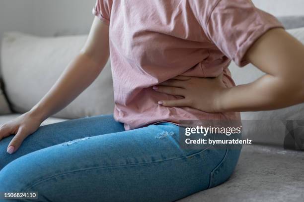 nierenprobleme - hip pain stock-fotos und bilder