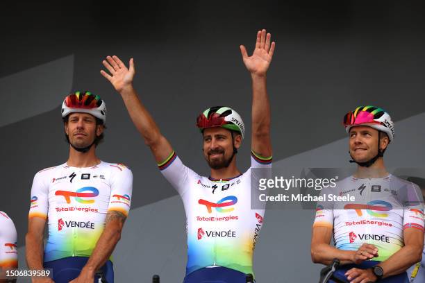 Daniel Oss of Italy, Peter Sagan of Slovakia and Edvald Boasson-Hagen of Norway and Team TotalEnergies prior to the stage one of the 110th Tour de...