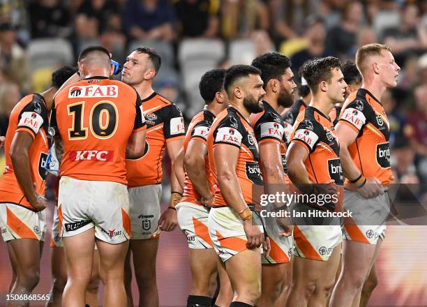 The Tigers look on waiting for a conversion attempt during the round 18 NRL match between North Queensland Cowboys and Wests Tigers at Qld Country...