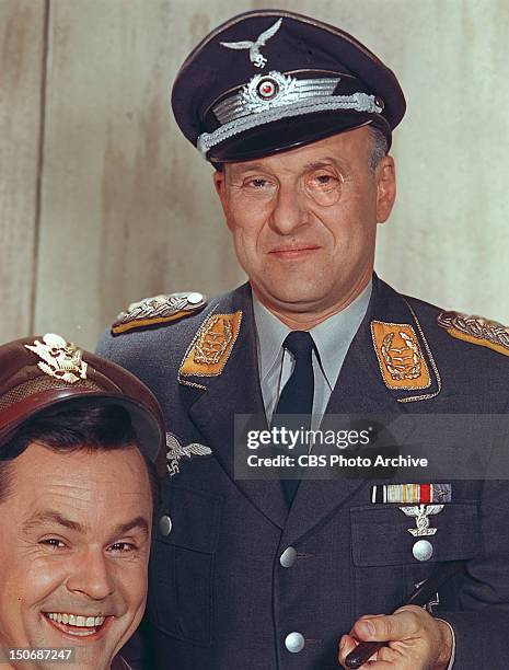 Werner Klemperer as Colonel Wilhelm Klink, standing, and Bob Crane as Colonel Robert Hogan in the CBS television series "Hogan's Heroes."