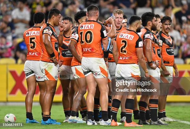 The Tigers look on waiting for a conversion attempt during the round 18 NRL match between North Queensland Cowboys and Wests Tigers at Qld Country...