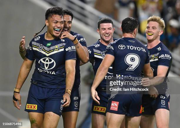 Jeremiah Nanai of the Cowboys celebrates after scoring a try during the round 18 NRL match between North Queensland Cowboys and Wests Tigers at Qld...