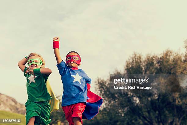 essere super - two young boys foto e immagini stock