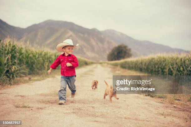 young on the farm - country western outside stockfoto's en -beelden