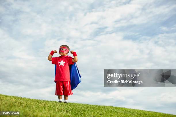 super power - child superman stock pictures, royalty-free photos & images