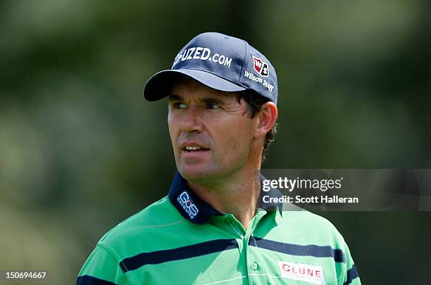 Padraig Harrington of Ireland walks on the 12th hole during the second round of The Barclays at the Black Course at Bethpage State Park August 24,...