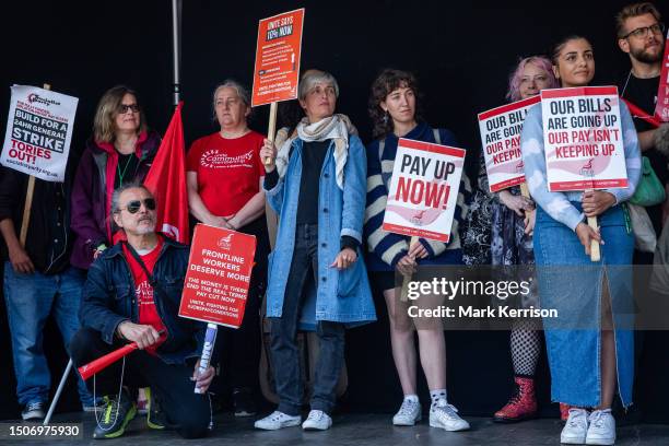 St Mungo's strikers from Unite the Union appear at a rally by striking teachers from the National Education Union in Parliament Square on 5 July 2023...