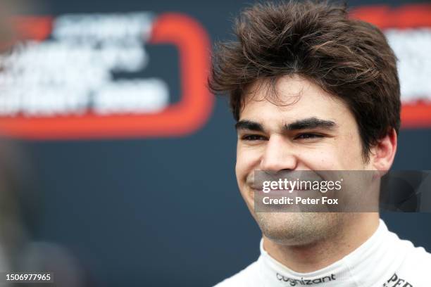 8th placed qualifier Lance Stroll of Canada and Aston Martin F1 Team talks to the media in the Paddock during the Sprint Shootout ahead of the F1...