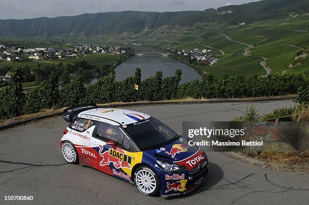 Sebastien Loeb of France and Daniel Elena of Monaco compete in their Citroen Total WRT Citroen Ds3 WRC during Day 1 of the WRC Rally Germany on...