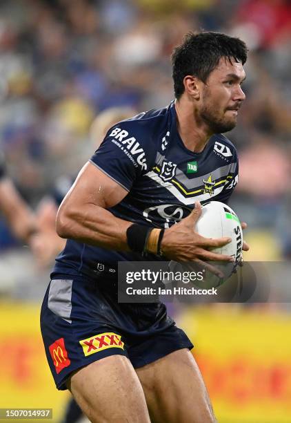 Jordan McLean of the Cowboys runs the ball during the round 18 NRL match between North Queensland Cowboys and Wests Tigers at Qld Country Bank...