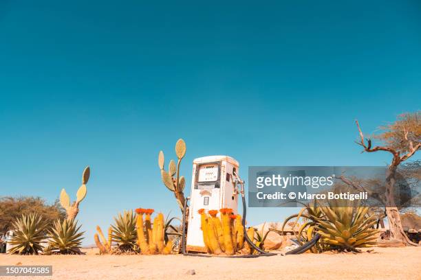 old gas pump in the namib desert - abandoned gas station stock pictures, royalty-free photos & images