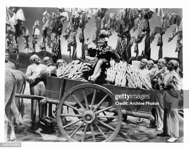 Carmen Miranda in carriage of bananas in a scene from the film 'The Gang's All Here', 1943.