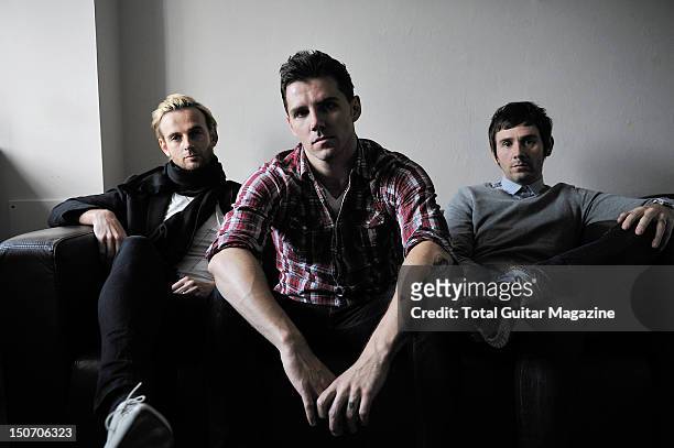 Lee Gaze, Stuart Richardson and Mike Lewis of Welsh hard rock group Lostprophets being interviewed for Total Guitar on November 24, 2009.