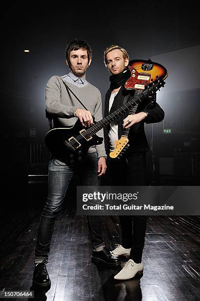 Portrait of guitarists Mike Lewis and Lee Gaze of Welsh hard rock group Lostprophets at The Forum in London on November 24, 2009.