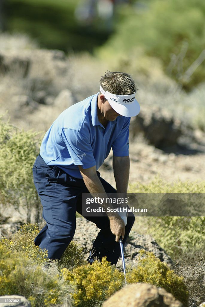 LAS VEGAS, NV - OCTOBER 13:  Stuart Appleby of Australia plays a shot from the rough during the fina