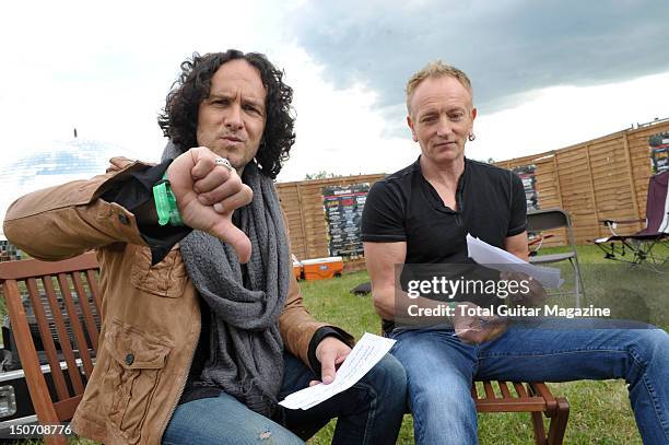 Vivian Campell and Phil Collen of English rock band Def Leppard, during an interview backstage at Download Festival, June 10 Donington Park.