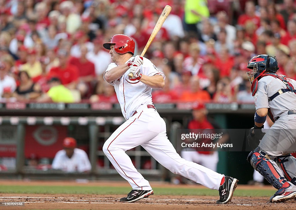 Scott Rolan Cincinnati Reds Scott Rolen of the Cincinnati Reds hits a single during the game ...