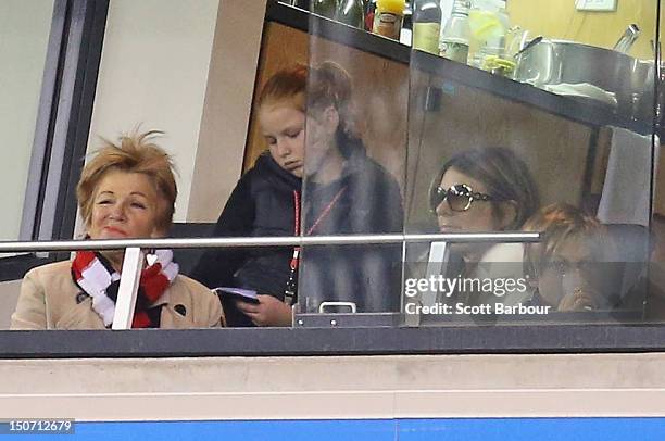 Bridgette Warne, Summer Warne, Elizabeth Hurley and Damian Hurley watch as Shane Warne plays a game of Aussie Rules football as he takes part in the...