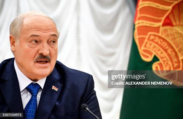 Belarus' President Alexander Lukashenko speaks as he meets with foreign media at his residence, the Independence Palace, in the capital Minsk on July...