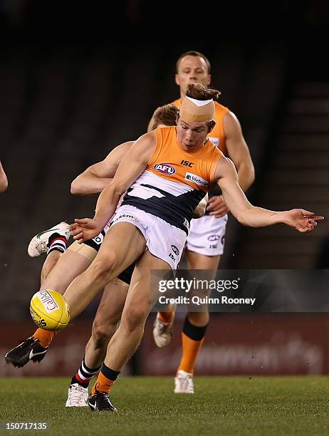 Toby Greene of the Giants kicks during the round 22 AFL match between the St Kilda Saints and the Greater Western Sydney Giants at Etihad Stadium on...