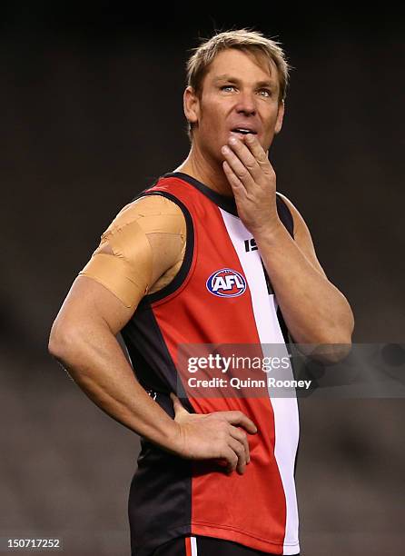 Shane Warne looks on during the St Kilda Thank You Round charity match at Etihad Stadium on August 25, 2012 in Melbourne, Australia.