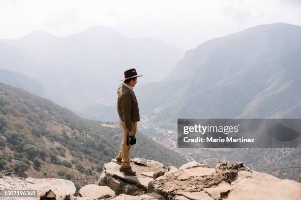young man admiring mountainous landscape - sierra gorda stock pictures, royalty-free photos & images