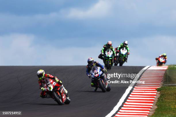 Alvaro Bautista of Spain and Team Aruba.it Racing riding The Ducati Panigale V4R leads the field during The World SBK Race 1 in the 2023 MOTUL FIM...