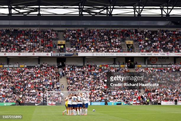 Players of England huddle prior to the Women's International Friendly match between England and Portugal at Stadium mk on July 01, 2023 in Milton...