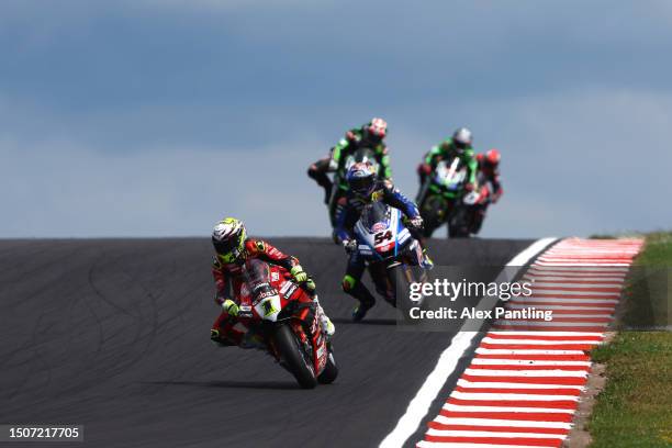 Alvaro Bautista of Spain and Team Aruba.it Racing riding The Ducati Panigale V4R leads the field during The World SBK Race 1 in the 2023 MOTUL FIM...