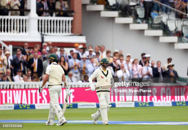 Nathan Lyon of Australia walks out to bat with an injured calf during Day Four of the LV= Insurance Ashes 2nd Test match between England and...