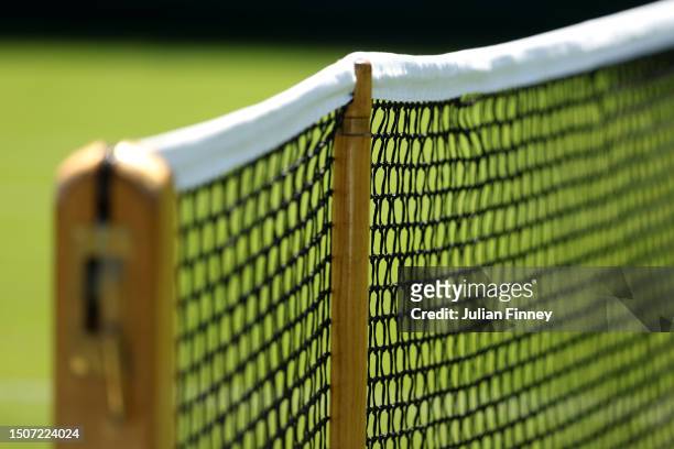 Tennis net is seen ahead of The Championships - Wimbledon 2023 at All England Lawn Tennis and Croquet Club on July 01, 2023 in London, England.