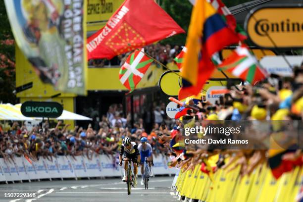 Adam Yates of United Kingdom and UAE Team Emirates sprints at finish line ahead of Simon Yates of United Kingdom and Team Jayco-AlUla during the...