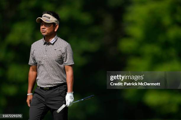 Hiroyuki Fujita of Japan walks on the first hole during the third round of the U.S. Senior Open Championship at SentryWorld on July 01, 2023 in...