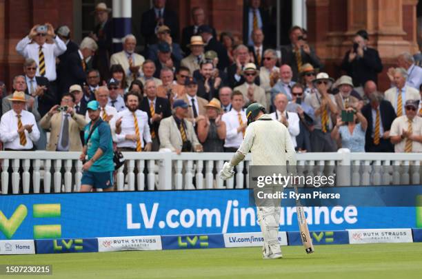 Nathan Lyon of Australia walks from the ground after batting with an injured calf during Day Four of the LV= Insurance Ashes 2nd Test match between...