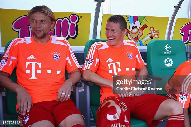 Anatoly Tymoshchuk and Bastian Schweinsteiger of Bayern sit on the bench during the Bundesliga match between Greuther Fuerth and FC Bayern Muenchen...