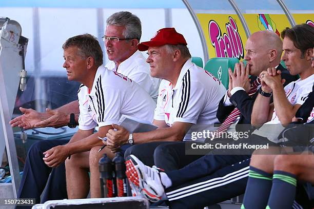 Head coach Jupp Heynckes, assistant coach Peter Herrmann, assistant coach Hermann Gerland and sporting director Matthias Sammer of Bayernsit on the...